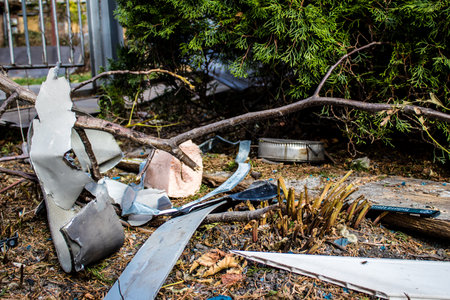 Aftermath of massive Russian missile attacks, debris littering the ground around the Samsung office building. The blast from the explosion sent shards of glass and metal in all directions causing extensive secondary damage, many people were seriously injuのeditorial素材