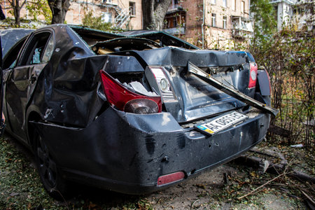 Aftermath of massive Russian missile attacks, cars around the Samsung office building was hit hard. The damage to the vehicles is considerable and several of them are destroyed.のeditorial素材