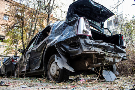 Aftermath of massive Russian missile attacks, cars around the Samsung office building was hit hard. The damage to the vehicles is considerable and several of them are destroyed.のeditorial素材