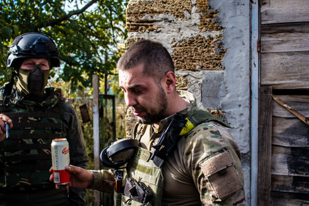 Soldiers have a resting time and enjoy before the attack, Ukrainian army infantry soldiers on the front line, they specialize in mortar fire from enemy lines. Their objective is to weaken the Russian army by permanent fire, their situation is very dangeroのeditorial素材