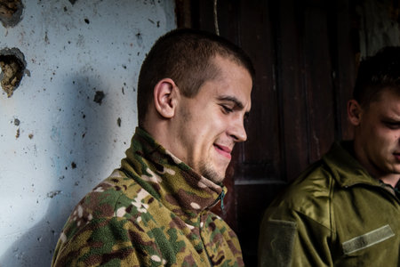 Soldiers have a resting time and enjoy before the attack, Ukrainian army infantry soldiers on the front line, they specialize in mortar fire from enemy lines. Their objective is to weaken the Russian army by permanent fire, their situation is very dangeroのeditorial素材