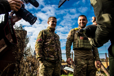 Ukrainian army infantry soldiers on the front line, they specialize in mortar fire from enemy lines. Their objective is to weaken the Russian army by permanent fire, their situation is very dangerous because the Russians retaliate quicklyのeditorial素材
