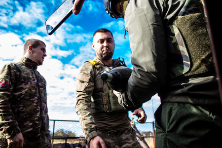 Ukrainian army infantry soldiers on the front line, they specialize in mortar fire from enemy lines. Their objective is to weaken the Russian army by permanent fire, their situation is very dangerous because the Russians retaliate quicklyのeditorial素材