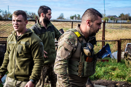 Ukrainian army infantry soldiers on the front line, they specialize in mortar fire from enemy lines. Their objective is to weaken the Russian army by permanent fire, their situation is very dangerous because the Russians retaliate quicklyのeditorial素材