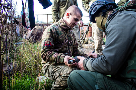 Ukrainian army infantry soldiers on the front line, they specialize in mortar fire from enemy lines. Their objective is to weaken the Russian army by permanent fire, their situation is very dangerous because the Russians retaliate quicklyのeditorial素材
