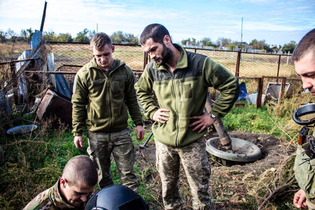 Ukrainian army infantry soldiers on the front line, they specialize in mortar fire from enemy lines. Their objective is to weaken the Russian army by permanent fire, their situation is very dangerous because the Russians retaliate quicklyのeditorial素材