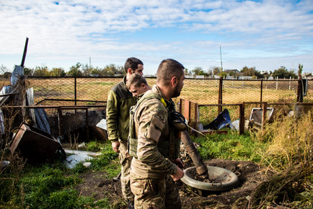 Ukrainian army infantry soldiers on the front line, they specialize in mortar fire from enemy lines. Their objective is to weaken the Russian army by permanent fire, their situation is very dangerous because the Russians retaliate quicklyのeditorial素材