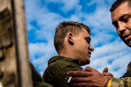 Soldiers have a resting time and enjoy before the attack, Ukrainian army infantry soldiers on the front line, they specialize in mortar fire from enemy lines. Their objective is to weaken the Russian army by permanent fire, their situation is very dangeroのeditorial素材