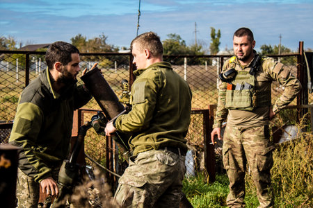 Ukrainian army infantry soldiers on the front line, they specialize in mortar fire from enemy lines. Their objective is to weaken the Russian army by permanent fire, their situation is very dangerous because the Russians retaliate quicklyのeditorial素材