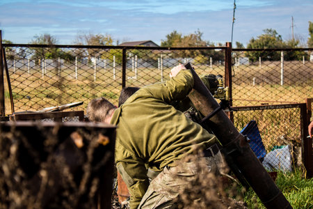 Ukrainian army infantry soldiers on the front line, they specialize in mortar fire from enemy lines. Their objective is to weaken the Russian army by permanent fire, their situation is very dangerous because the Russians retaliate quicklyのeditorial素材