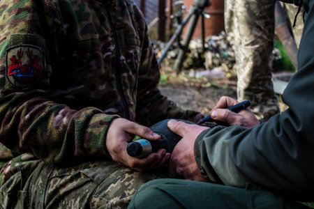 Ukrainian army infantry soldiers on the front line, they specialize in mortar fire from enemy lines. Their objective is to weaken the Russian army by permanent fire, their situation is very dangerous because the Russians retaliate quicklyのeditorial素材