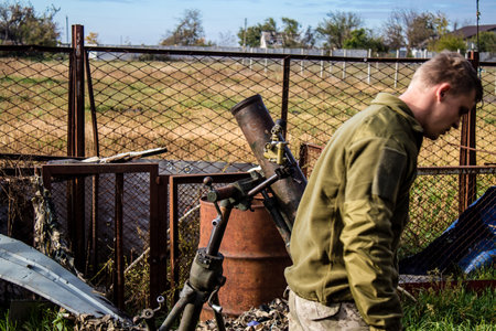 Ukrainian army infantry soldiers on the front line, they specialize in mortar fire from enemy lines. Their objective is to weaken the Russian army by permanent fire, their situation is very dangerous because the Russians retaliate quicklyのeditorial素材