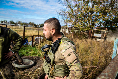 Ukrainian army infantry soldiers on the front line, they specialize in mortar fire from enemy lines. Their objective is to weaken the Russian army by permanent fire, their situation is very dangerous because the Russians retaliate quicklyのeditorial素材