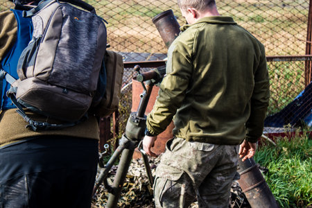 Ukrainian army infantry soldiers on the front line, they specialize in mortar fire from enemy lines. Their objective is to weaken the Russian army by permanent fire, their situation is very dangerous because the Russians retaliate quicklyのeditorial素材