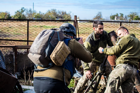 Ukrainian army infantry soldiers on the front line, they specialize in mortar fire from enemy lines. Their objective is to weaken the Russian army by permanent fire, their situation is very dangerous because the Russians retaliate quicklyのeditorial素材