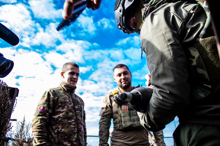 Ukrainian army infantry soldiers on the front line, they specialize in mortar fire from enemy lines. Their objective is to weaken the Russian army by permanent fire, their situation is very dangerous because the Russians retaliate quicklyのeditorial素材