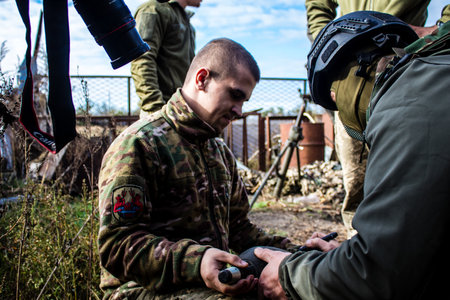 Ukrainian army infantry soldiers on the front line, they specialize in mortar fire from enemy lines. Their objective is to weaken the Russian army by permanent fire, their situation is very dangerous because the Russians retaliate quicklyのeditorial素材