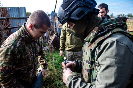 Ukrainian army infantry soldiers on the front line, they specialize in mortar fire from enemy lines. Their objective is to weaken the Russian army by permanent fire, their situation is very dangerous because the Russians retaliate quicklyのeditorial素材
