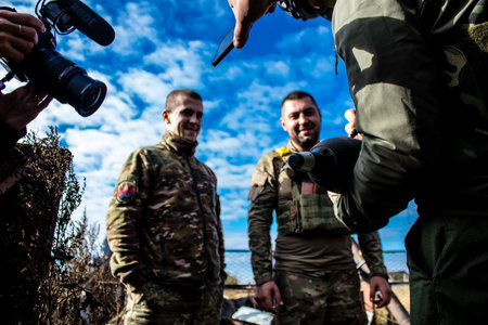 Ukrainian army infantry soldiers on the front line, they specialize in mortar fire from enemy lines. Their objective is to weaken the Russian army by permanent fire, their situation is very dangerous because the Russians retaliate quicklyのeditorial素材