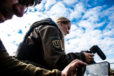 Ukrainian army infantry soldiers on the front line, they specialize in mortar fire from enemy lines. Their objective is to weaken the Russian army by permanent fire, their situation is very dangerous because the Russians retaliate quicklyのeditorial素材