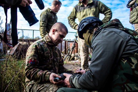 Ukrainian army infantry soldiers on the front line, they specialize in mortar fire from enemy lines. Their objective is to weaken the Russian army by permanent fire, their situation is very dangerous because the Russians retaliate quicklyのeditorial素材