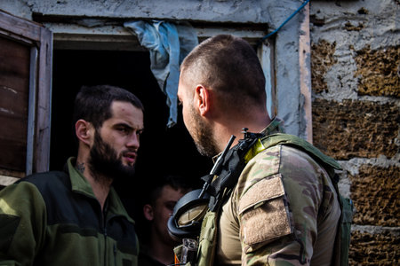 Soldiers have a resting time and enjoy before the attack, Ukrainian army infantry soldiers on the front line, they specialize in mortar fire from enemy lines. Their objective is to weaken the Russian army by permanent fire, their situation is very dangeroのeditorial素材
