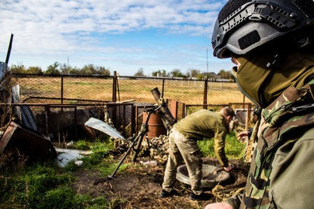 Ukrainian army infantry soldiers on the front line, they specialize in mortar fire from enemy lines. Their objective is to weaken the Russian army by permanent fire, their situation is very dangerous because the Russians retaliate quicklyのeditorial素材