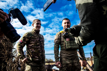 Ukrainian army infantry soldiers on the front line, they specialize in mortar fire from enemy lines. Their objective is to weaken the Russian army by permanent fire, their situation is very dangerous because the Russians retaliate quicklyのeditorial素材