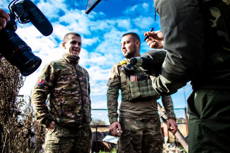 Ukrainian army infantry soldiers on the front line, they specialize in mortar fire from enemy lines. Their objective is to weaken the Russian army by permanent fire, their situation is very dangerous because the Russians retaliate quicklyのeditorial素材