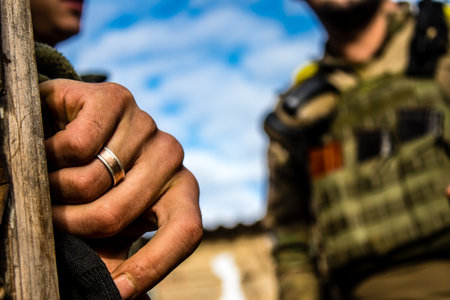 Soldiers have a resting time and enjoy before the attack, Ukrainian army infantry soldiers on the front line, they specialize in mortar fire from enemy lines. Their objective is to weaken the Russian army by permanent fire, their situation is very dangeroのeditorial素材