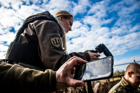 Ukrainian army infantry soldiers on the front line, they specialize in mortar fire from enemy lines. Their objective is to weaken the Russian army by permanent fire, their situation is very dangerous because the Russians retaliate quicklyのeditorial素材