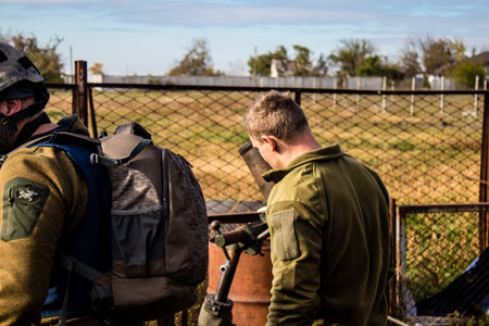 Ukrainian army infantry soldiers on the front line, they specialize in mortar fire from enemy lines. Their objective is to weaken the Russian army by permanent fire, their situation is very dangerous because the Russians retaliate quicklyのeditorial素材