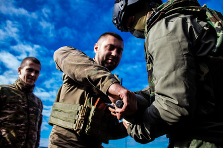 Ukrainian army infantry soldiers on the front line, they specialize in mortar fire from enemy lines. Their objective is to weaken the Russian army by permanent fire, their situation is very dangerous because the Russians retaliate quicklyのeditorial素材