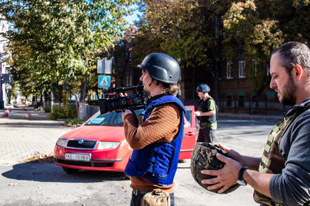 Portrait of Tomas Davidov, a famous Slovak television journalist working in a team with Matej Sulc in the city of Bakhmut, covering the war under the bombardments, this journalist was in the conflict zone and provided direct information on the situation. のeditorial素材