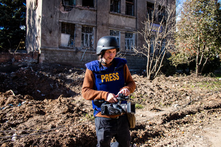 Portrait of Tomas Davidov, a famous Slovak television journalist working in a team with Matej Sulc in the city of Bakhmut, covering the war under the bombardments, this journalist was in the conflict zone and provided direct information on the situation. のeditorial素材