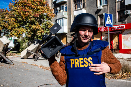 Portrait of Tomas Davidov, a famous Slovak television journalist working in a team with Matej Sulc in the city of Bakhmut, covering the war under the bombardments, this journalist was in the conflict zone and provided direct information on the situation. のeditorial素材