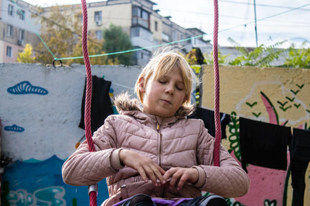 Children from Bakhmut in Ukraine residing at the Dnipro refugee house. Caritas Ukraine provides humanitarian aid and supports communities affected by the long-term impacts of the conflict, including emergency supplies, education and healthcareのeditorial素材