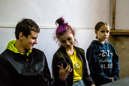Children from Bakhmut in Ukraine residing at the Dnipro refugee house. Caritas Ukraine provides humanitarian aid and supports communities affected by the long-term impacts of the conflict, including emergency supplies, education and healthcareのeditorial素材