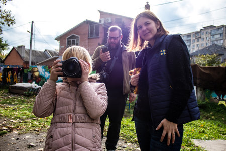 Children from Bakhmut in Ukraine residing at the Dnipro refugee house. Caritas Ukraine provides humanitarian aid and supports communities affected by the long-term impacts of the conflict, including emergency supplies, education and healthcareのeditorial素材