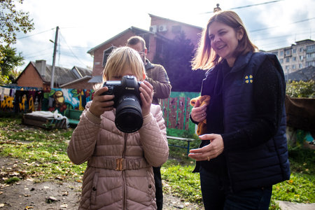 Children from Bakhmut in Ukraine residing at the Dnipro refugee house. Caritas Ukraine provides humanitarian aid and supports communities affected by the long-term impacts of the conflict, including emergency supplies, education and healthcareのeditorial素材
