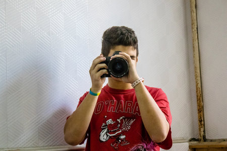Children from Bakhmut in Ukraine residing at the Dnipro refugee house. Caritas Ukraine provides humanitarian aid and supports communities affected by the long-term impacts of the conflict, including emergency supplies, education and healthcareのeditorial素材