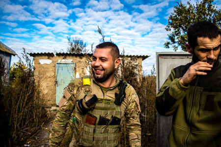 Soldiers have a resting time and enjoy before the attack, Ukrainian army infantry soldiers on the front line, they specialize in mortar fire from enemy lines. Their objective is to weaken the Russian army by permanent fire, their situation is very dangeroのeditorial素材