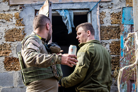 Soldiers have a resting time and enjoy before the attack, Ukrainian army infantry soldiers on the front line, they specialize in mortar fire from enemy lines. Their objective is to weaken the Russian army by permanent fire, their situation is very dangeroのeditorial素材