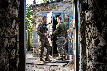 Soldiers have a resting time and enjoy before the attack, Ukrainian army infantry soldiers on the front line, they specialize in mortar fire from enemy lines. Their objective is to weaken the Russian army by permanent fire, their situation is very dangeroのeditorial素材