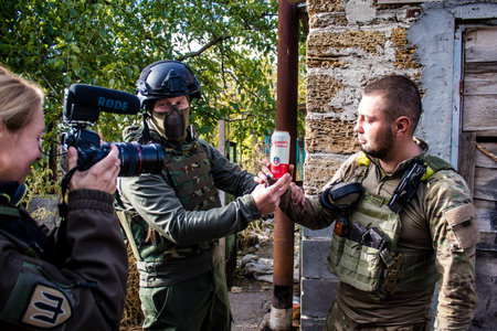 Soldiers have a resting time and enjoy before the attack, Ukrainian army infantry soldiers on the front line, they specialize in mortar fire from enemy lines. Their objective is to weaken the Russian army by permanent fire, their situation is very dangeroのeditorial素材