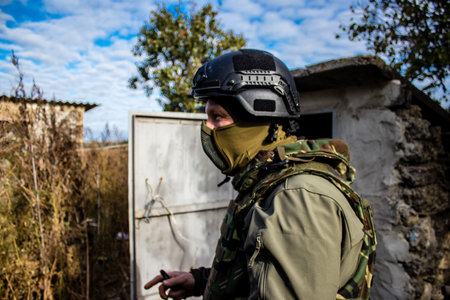 Soldiers have a resting time and enjoy before the attack, Ukrainian army infantry soldiers on the front line, they specialize in mortar fire from enemy lines. Their objective is to weaken the Russian army by permanent fire, their situation is very dangeroのeditorial素材