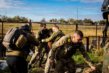 Ukrainian army infantry soldiers on the front line, they specialize in mortar fire from enemy lines. Their objective is to weaken the Russian army by permanent fire, their situation is very dangerous because the Russians retaliate quicklyのeditorial素材