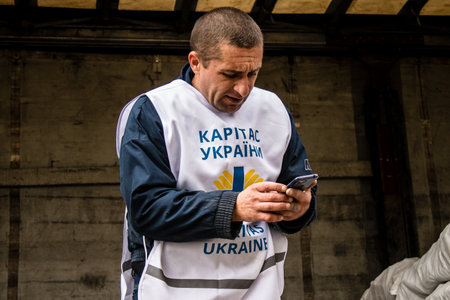 Home delivery of supplies by truck in Dnipro area to a family. Caritas Ukraine provides humanitarian aid and supports communities affected by the long-term impacts of the conflict, including emergency supplies, education and healthcareのeditorial素材