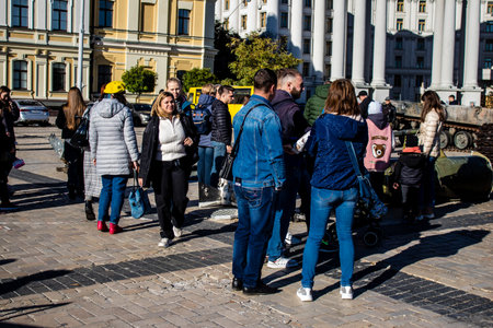 People visiting an open air exhibition and features Russian military equipment that was captured and destroyed during the 2022 Russian invasion of Ukraineのeditorial素材