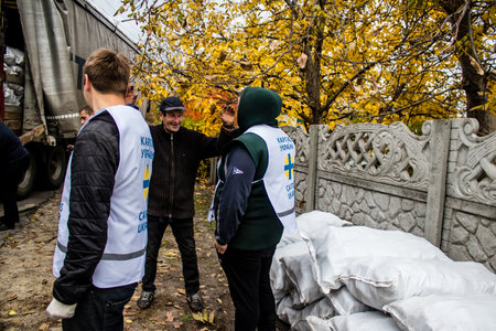Home delivery of supplies by truck in Dnipro area to a family. Caritas Ukraine provides humanitarian aid and supports communities affected by the long-term impacts of the conflict, including emergency supplies, education and healthcareのeditorial素材